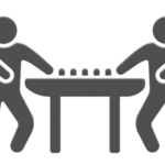 icon of two people playing at a game table
